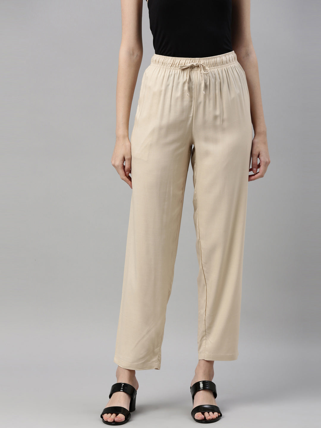 Women Solid Light Beige Mid Rise Casual Pants