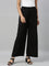 Women Solid Black Woven Viscose Mid Rise Basic Palazzos