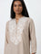 Utsa Beige Paisley Embroidered High-Low Kurti