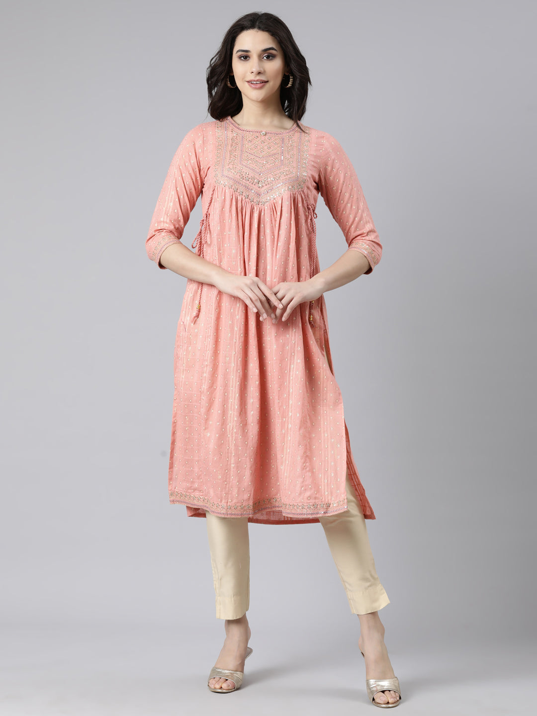 Neerus Peach Pleated Straight Bandhani Kurtas