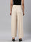 Women Solid Light Beige Viscose Mid Rise Knit Palazzos