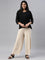 Women Solid Light Beige Viscose Mid Rise Knit Palazzos