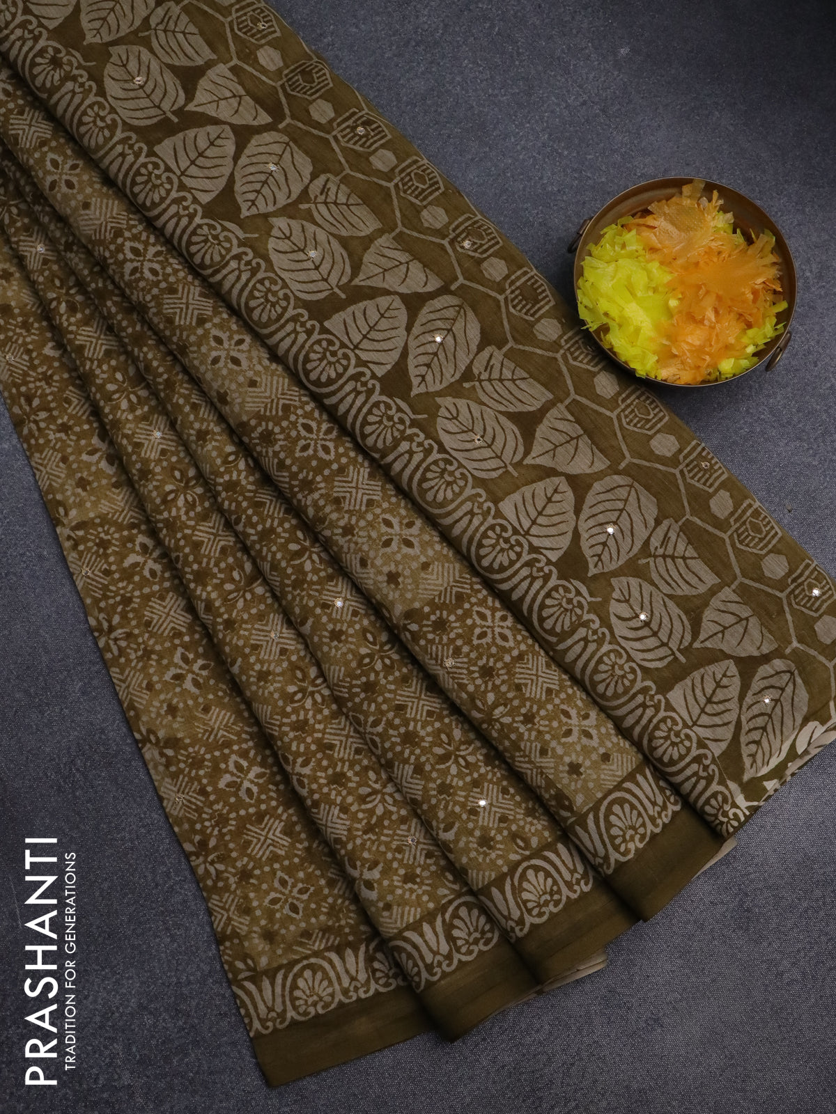 Chanderi silk cotton saree mustard green with allover prints & mirror work and printed border