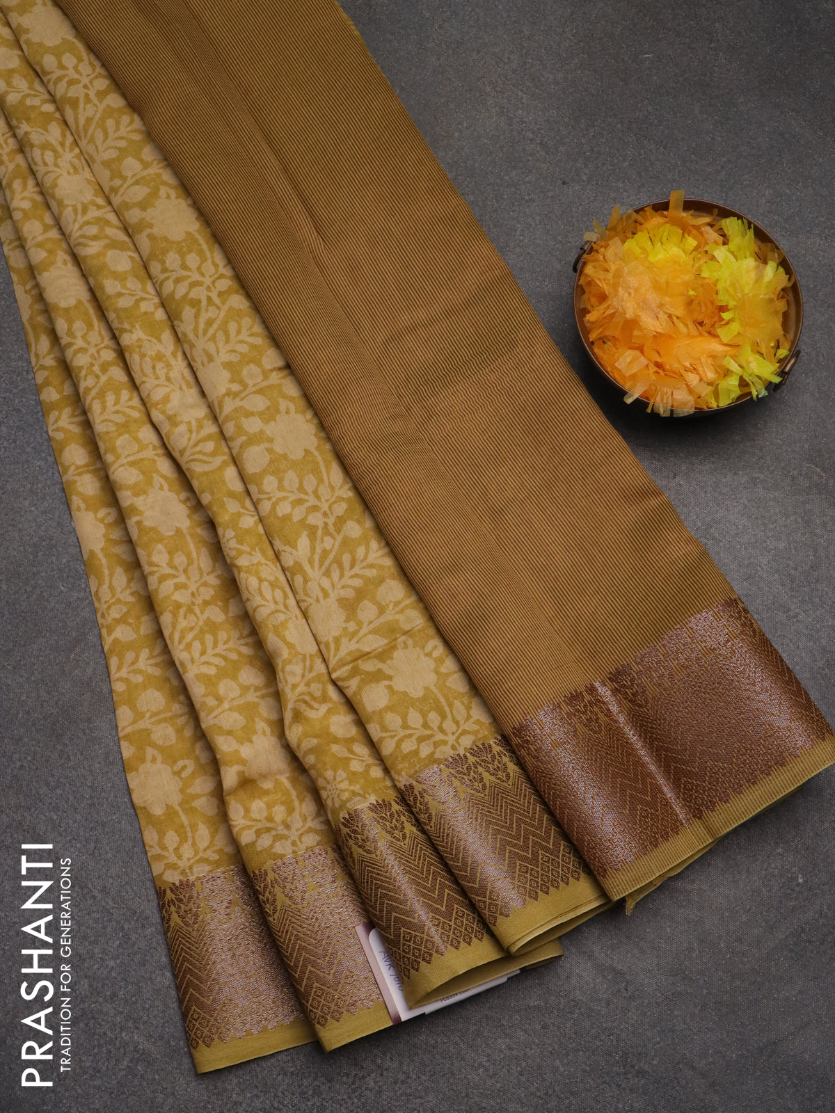 Chanderi silk cotton saree mustard shade with allover floral prints and banarasi style border