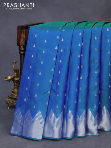 Pure kanchipuram silk saree dual shade of bluish green with silver zari woven buttas and silver zari woven border