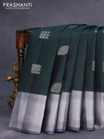 Pure kanchipuram silk saree bottle green and grey with allover self emboss & silver zari buttas and zari woven border