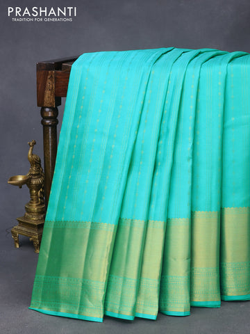 Pure kanchipuram silk saree teal blue shade with allover zari weaves and long zari woven border