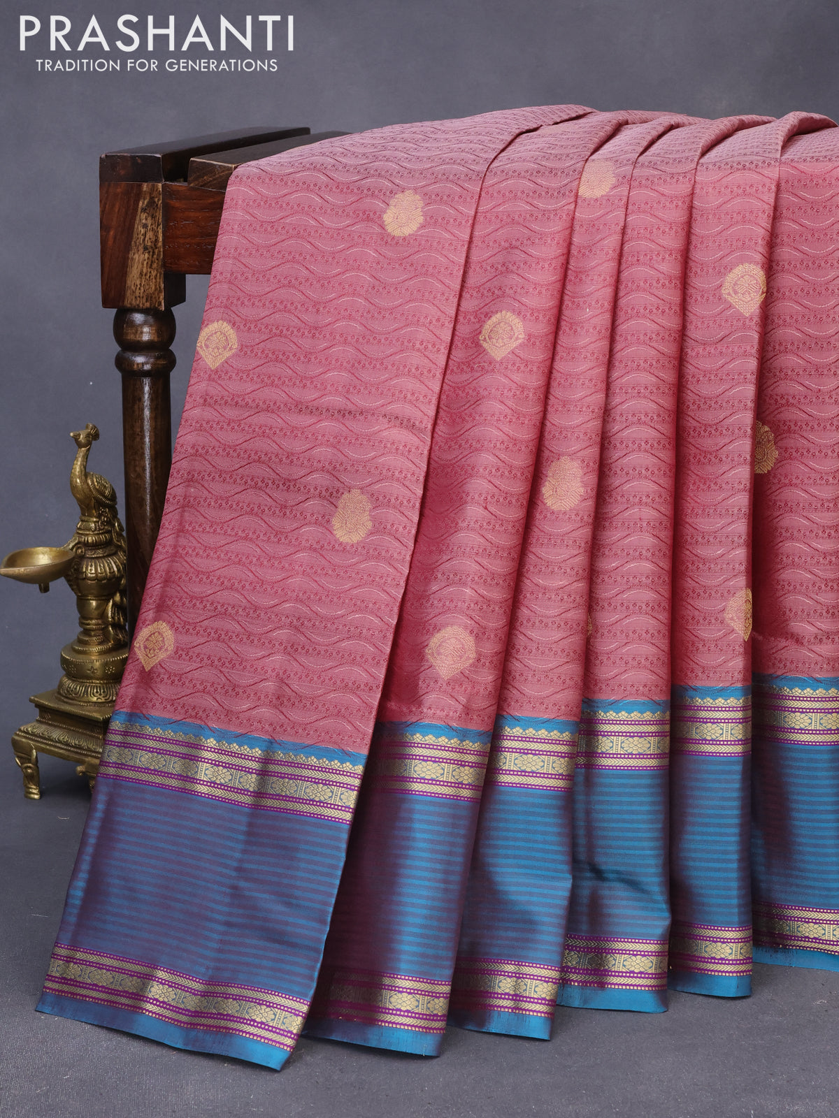 Pure kanchipuram silk saree wine shade and cs blue with allover self emboss & zari weaves and rettapet zari woven border