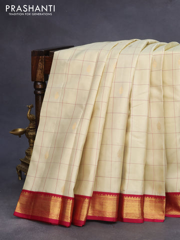 Pure kanchipuram silk saree cream and dark pink with allover checked pattern & buttas and zari woven korvai border