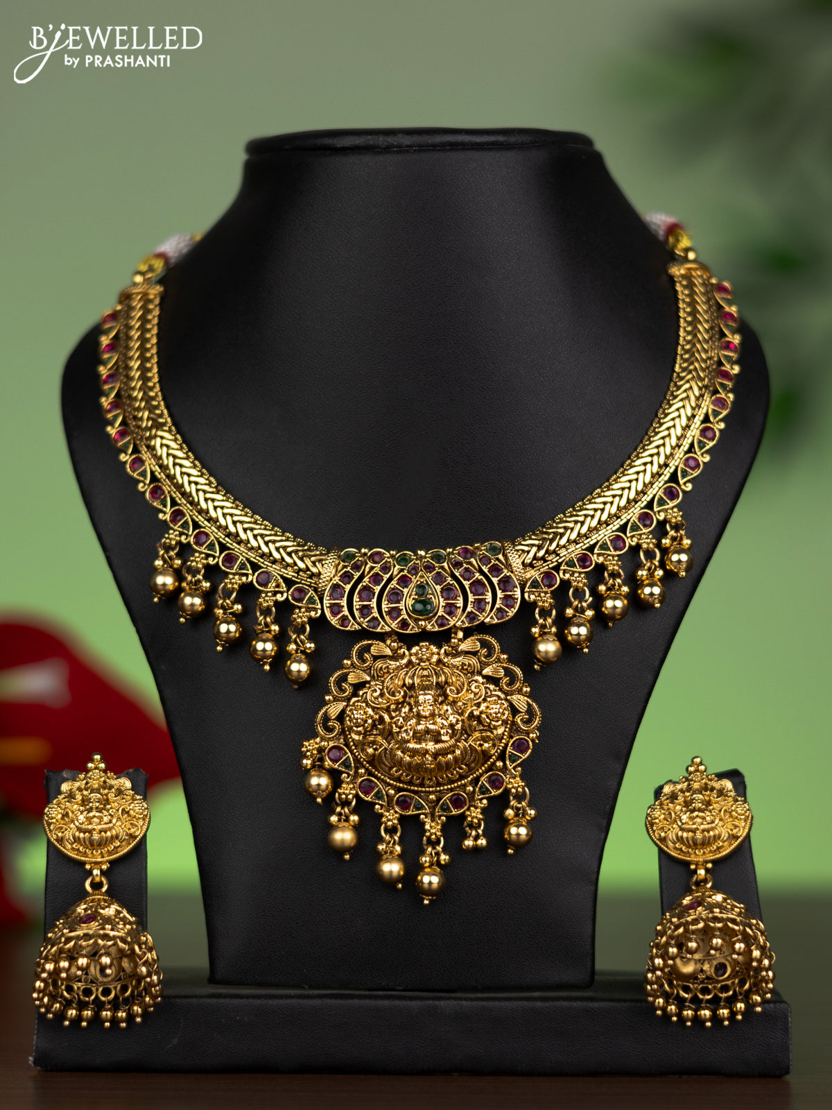Antique attigai necklace lakshmi design with kemp stones and golden beads hanging