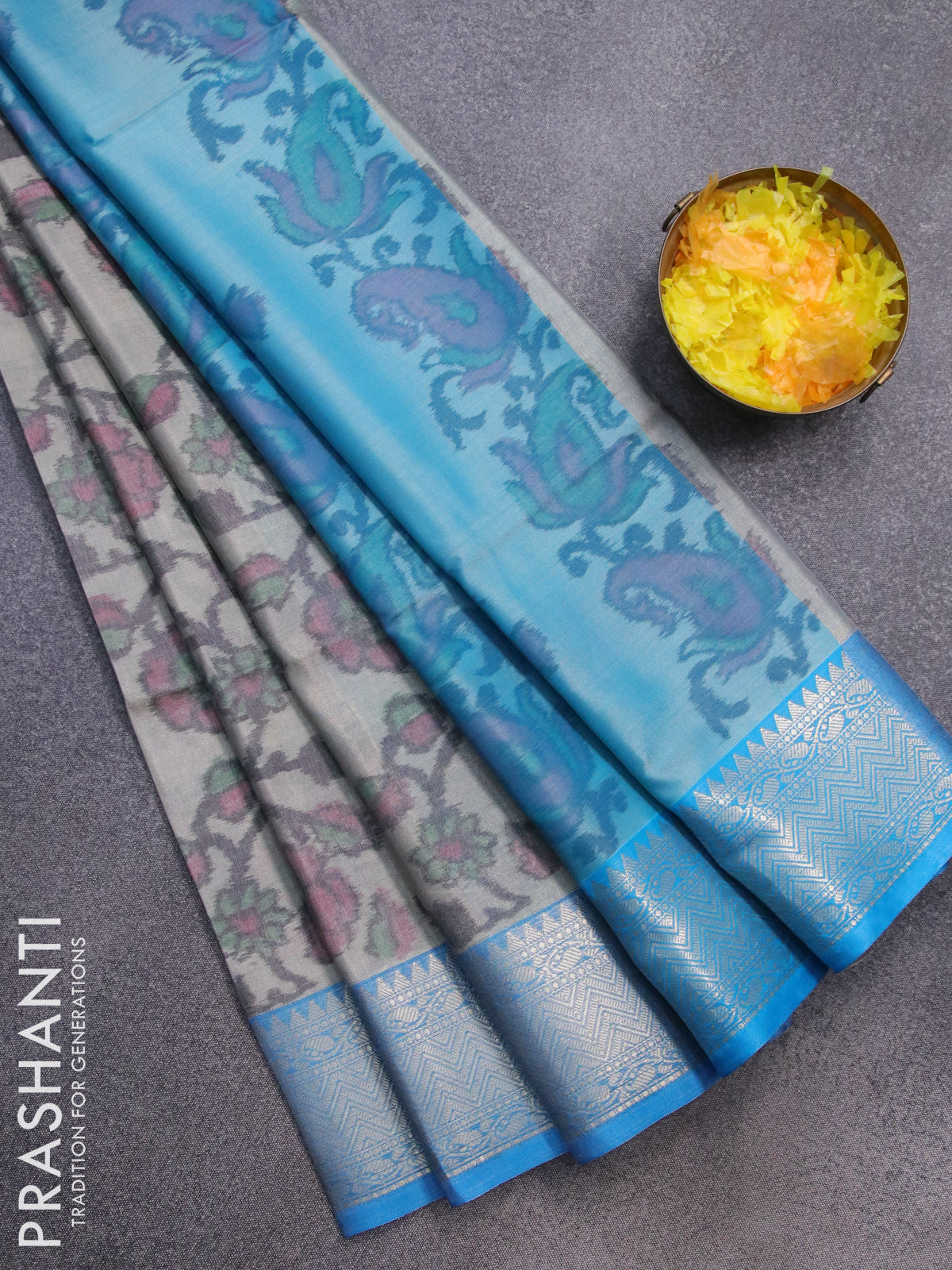 Banarasi semi tussar saree grey and cs blue with allover ikat weaves and silver zari woven border