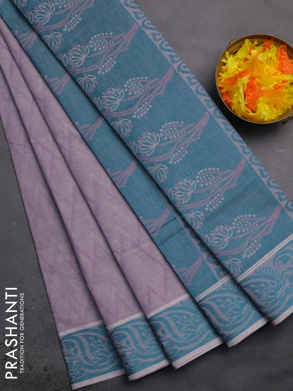 Coimbatore cotton saree pastel lavender and teal green with allover self emboss and thread woven border