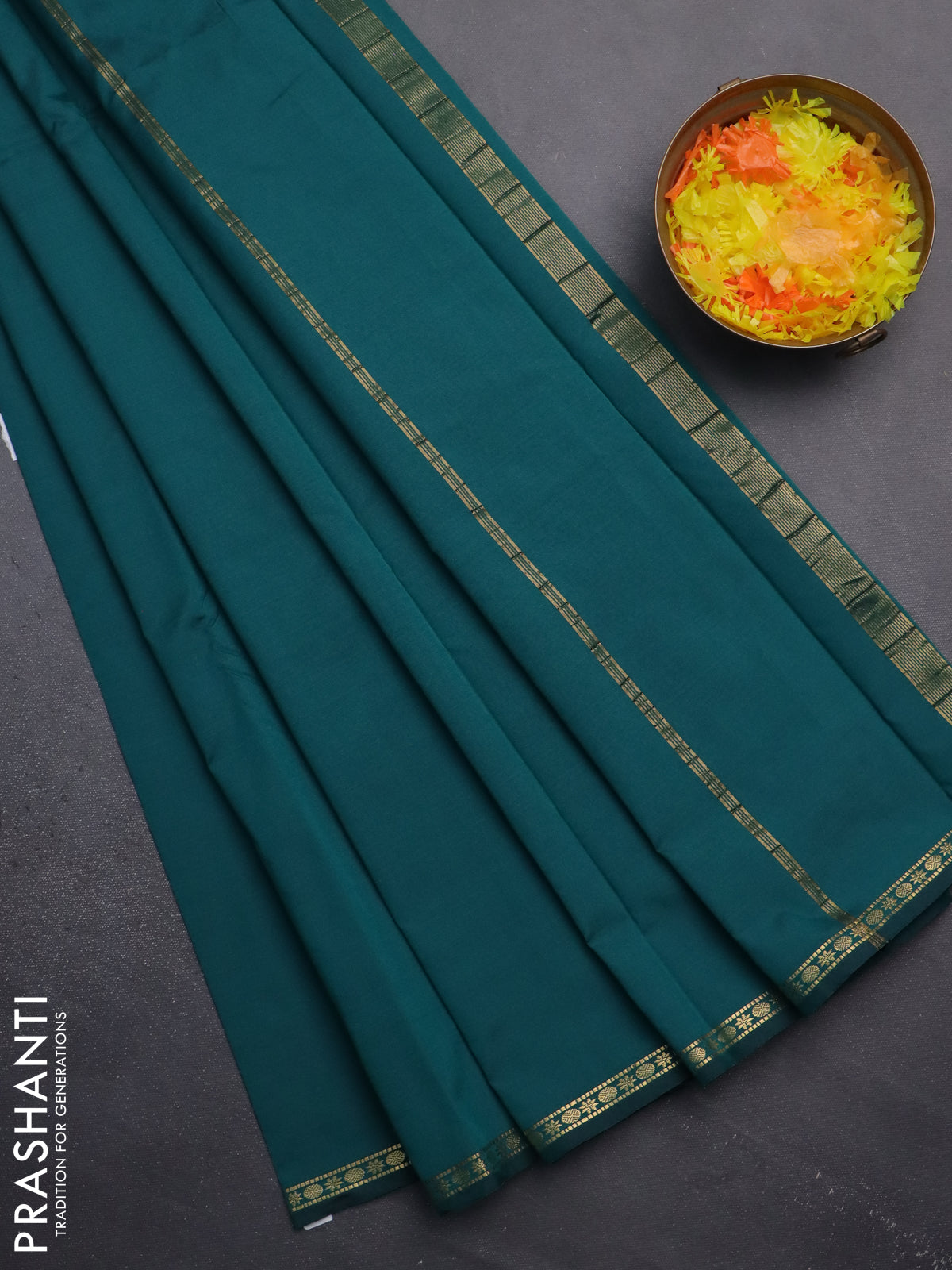 Arani semi silk saree peacock green with plain body and small zari woven border