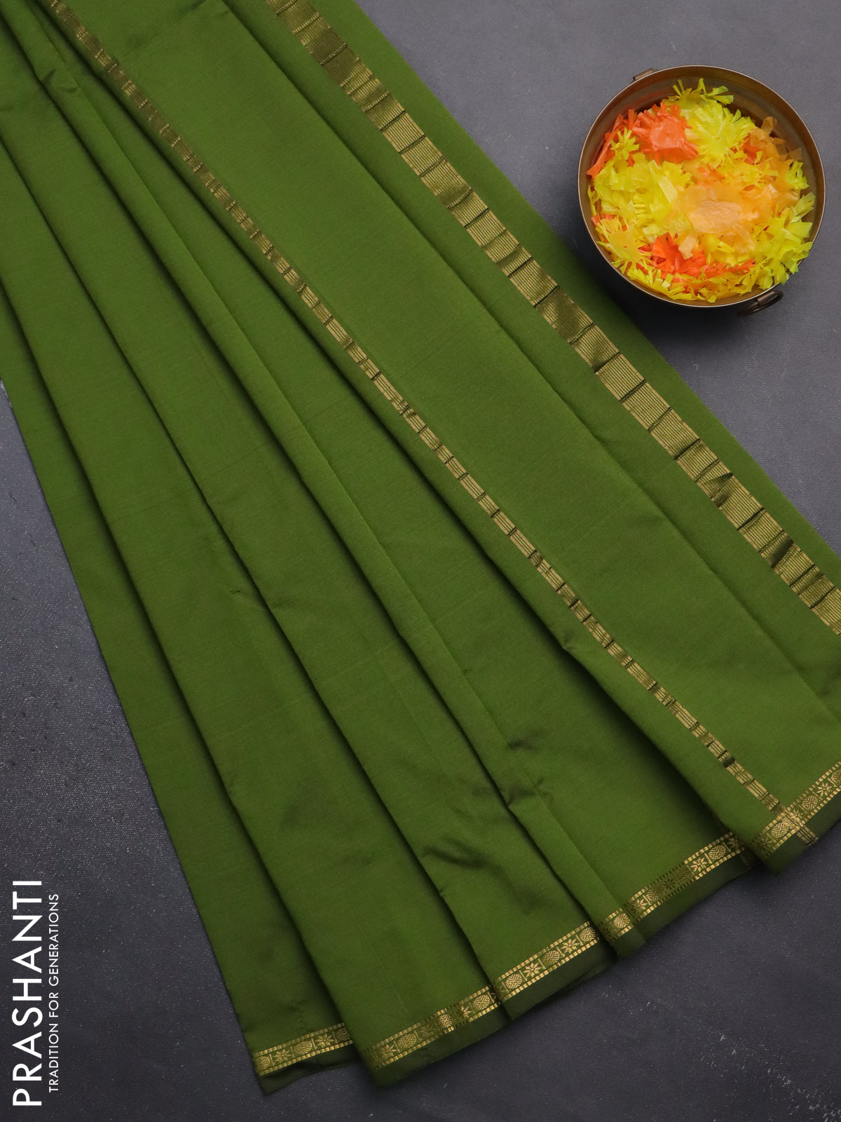 Arani semi silk saree sap green with plain body and small zari woven border