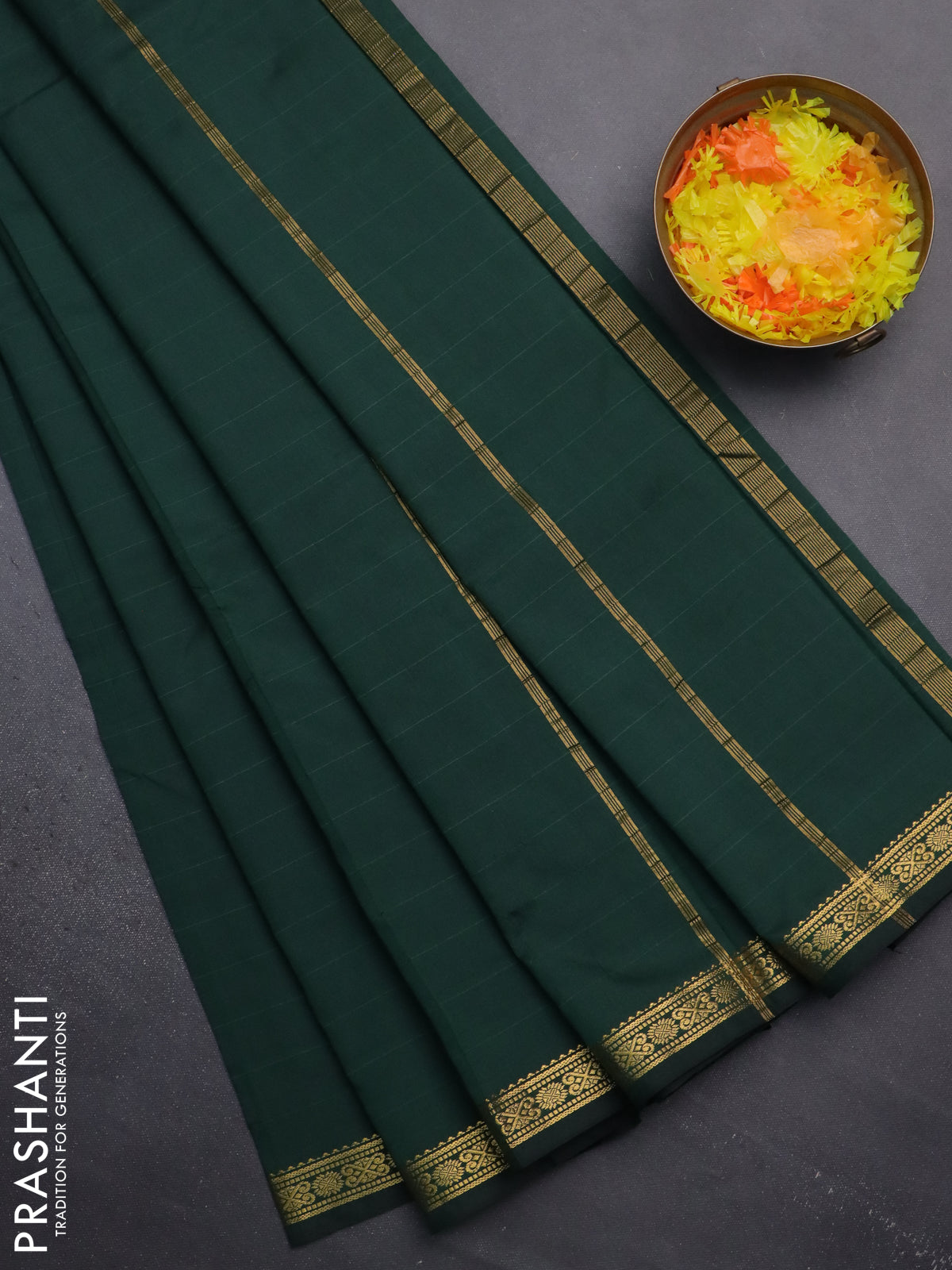 Arani semi silk saree bottle green with plain body and zari woven border