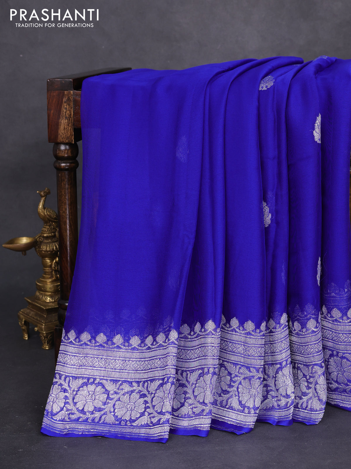 Banarasi chiffon silk saree royal blue with silver zari woven buttas and silver zari woven border