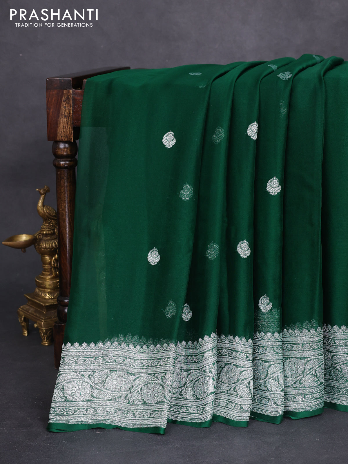 Banarasi chiffon silk saree dark green with silver zari woven buttas and silver zari woven border