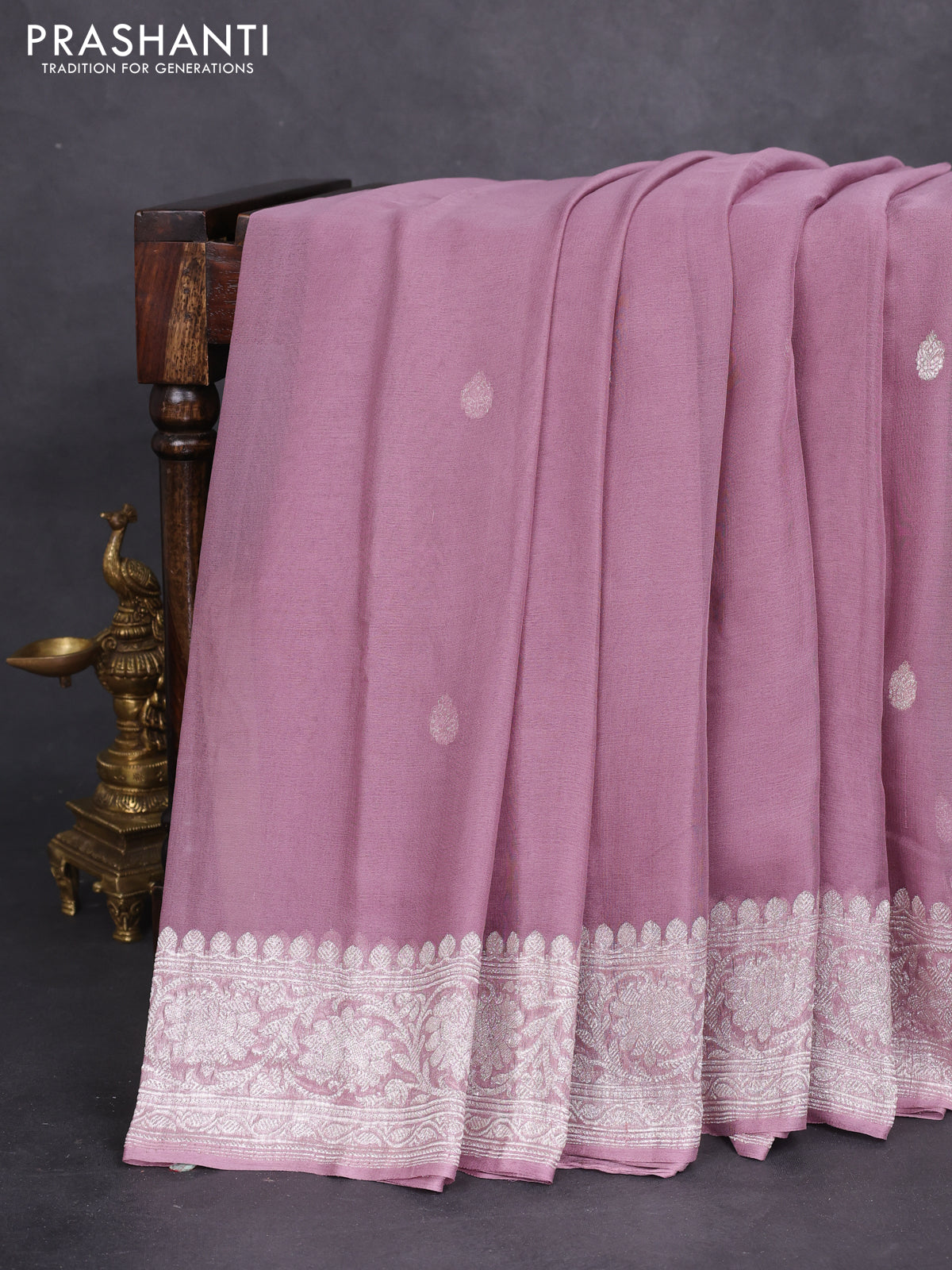 Banarasi chiffon silk saree pastel pink with silver zari woven buttas and silver zari woven border