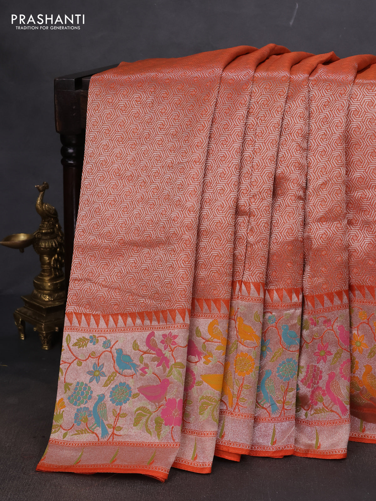 Banarasi semi raw silk saree orange with allover silver woven brocade weaves and floral design paithani border
