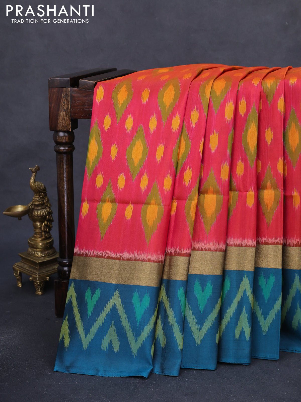 Ikat soft silk saree dual shade of pink and peacock green with allover ikat weaves and long zari woven ikat style border