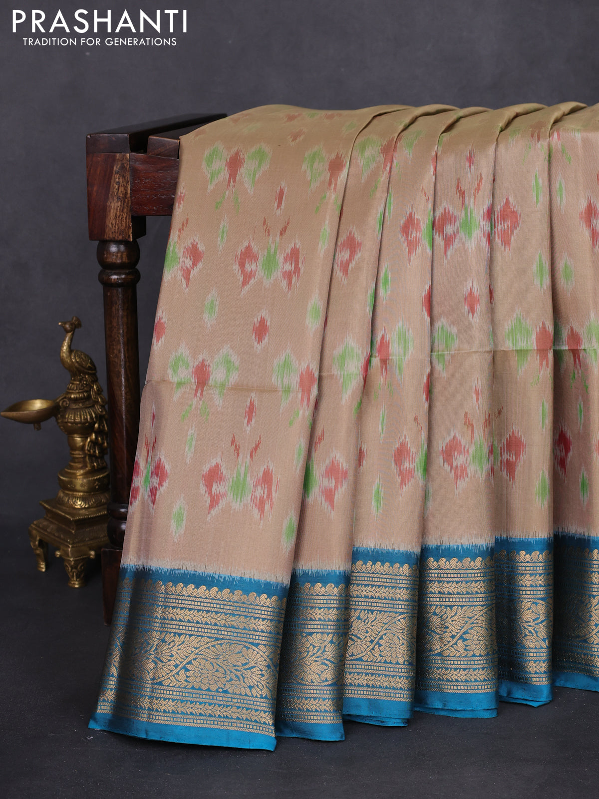 Ikat soft silk saree beige and cs blue with allover ikat weaves and zari woven border
