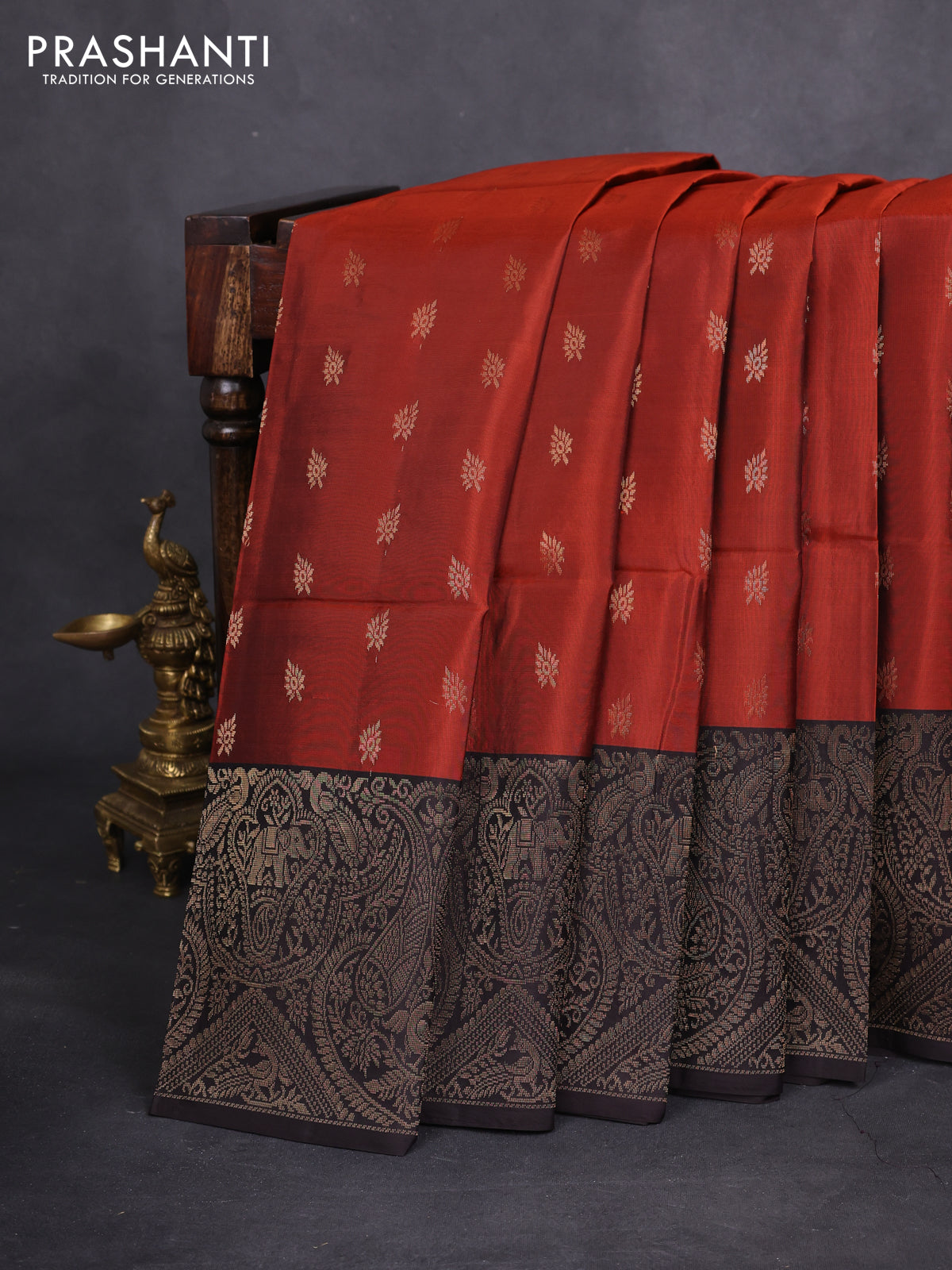 Kanchipuram soft silk saree rust shade and deep coffee brown with allover zari woven buttas and long zari woven border