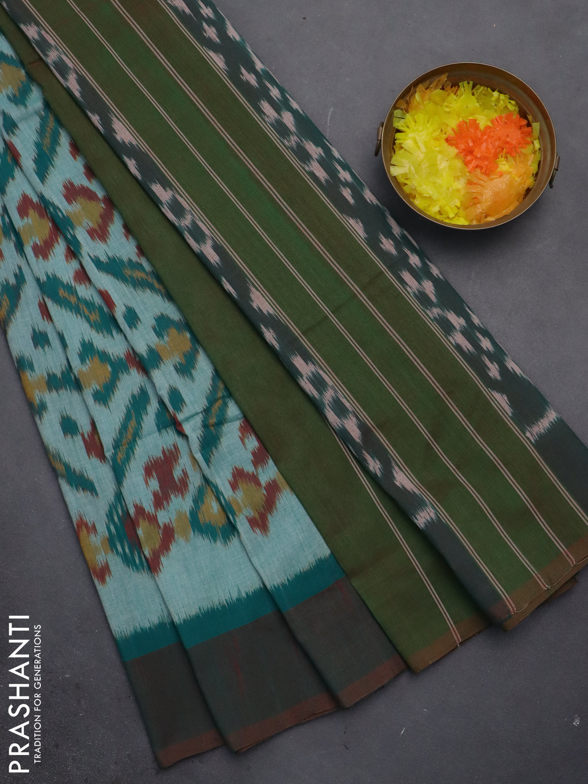 Ikat cotton saree teal green and broon with allover ikat butta weaves and simple border