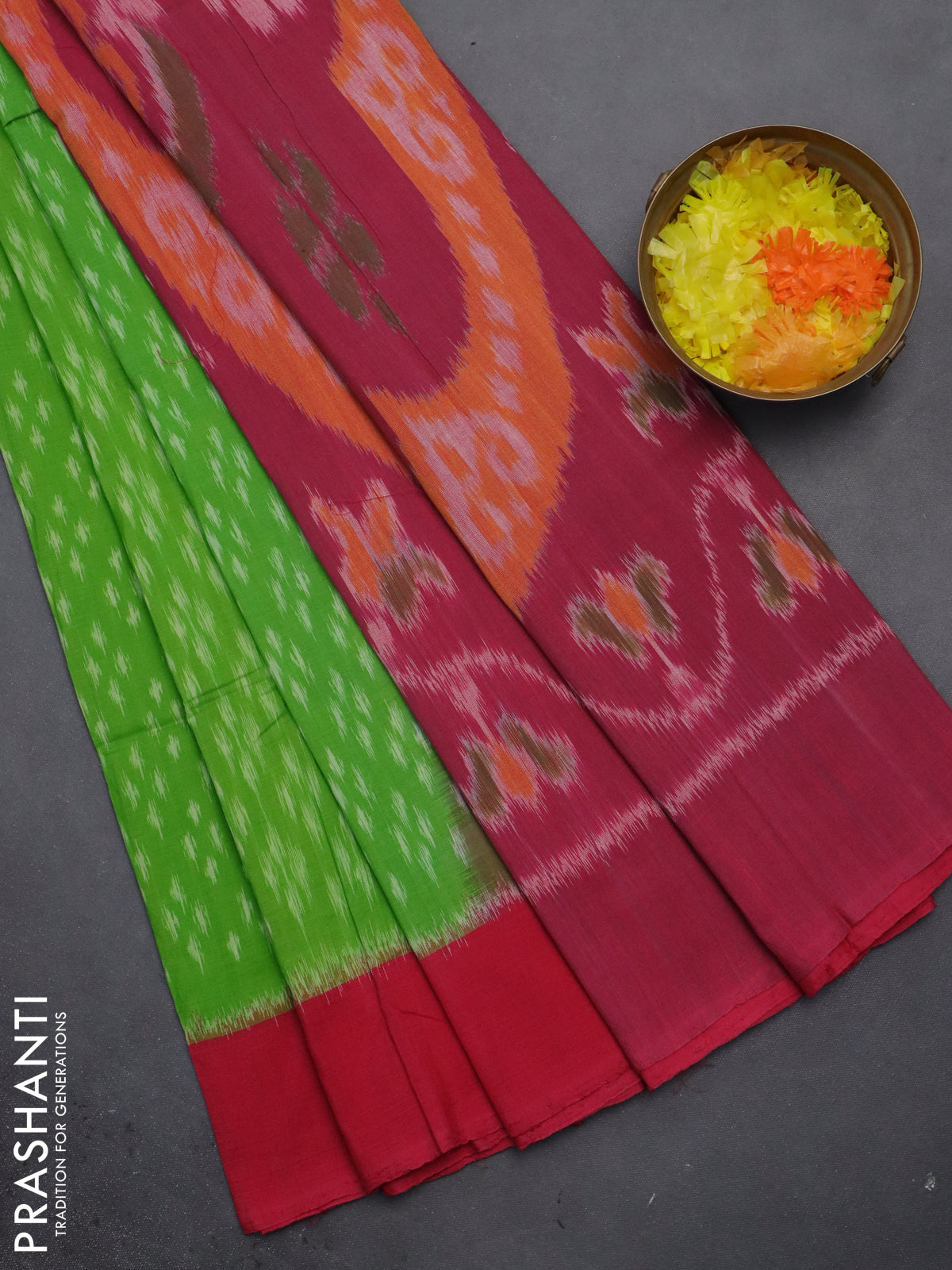 Ikat cotton saree light green and pink with allover ikat weaves and long ikat style border