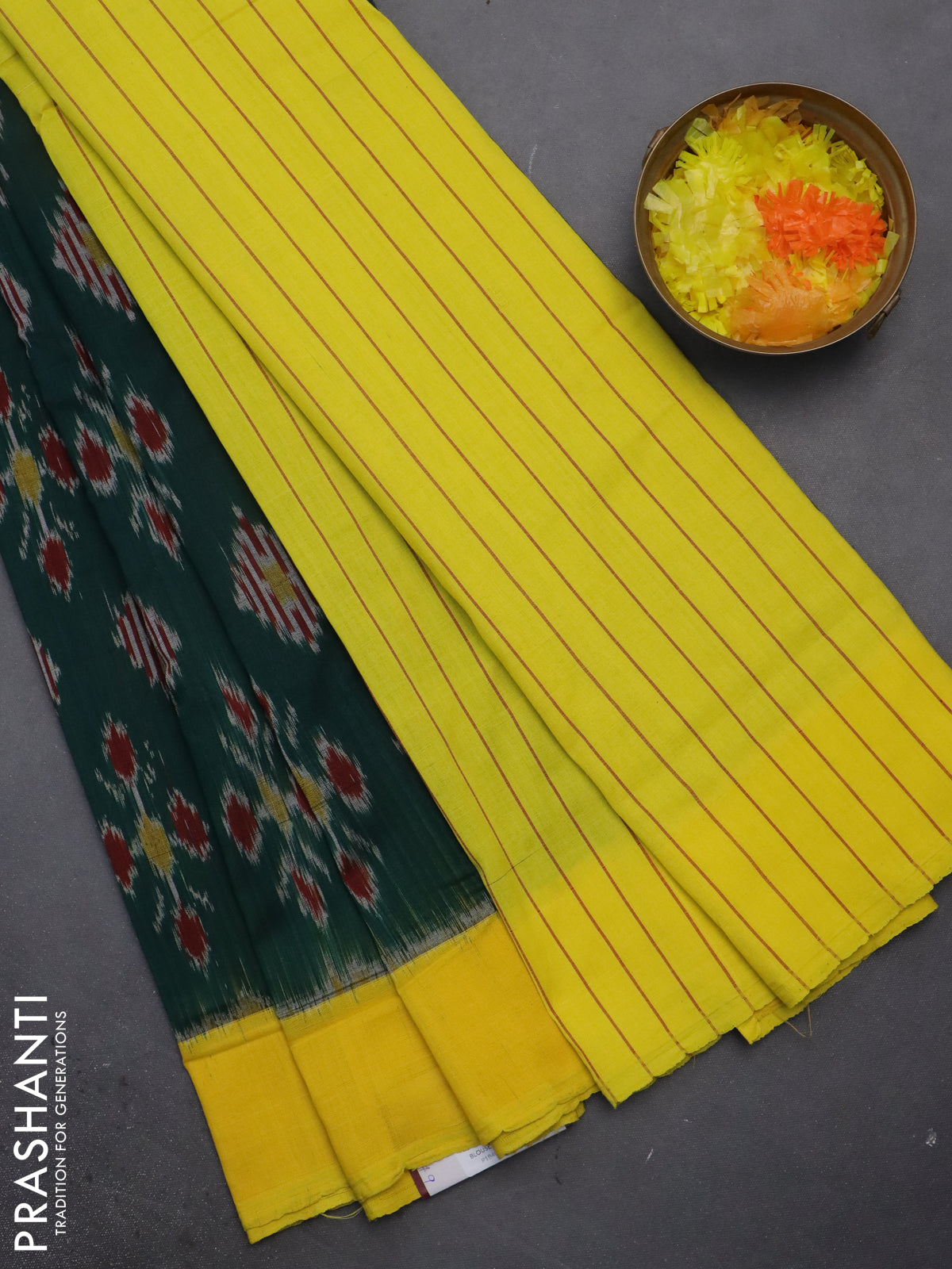 Ikat cotton saree bottle green and yellow with allover ikat butta weaves and simple border