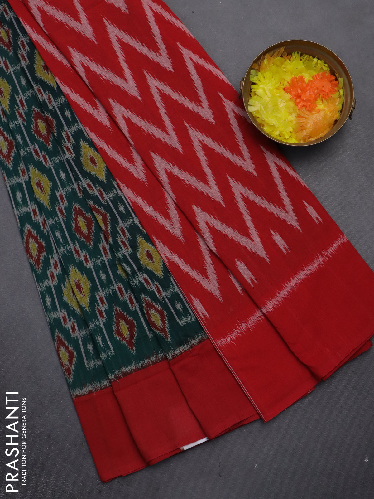 Ikat cotton saree dark green and red with allover ikat weaves and simple border