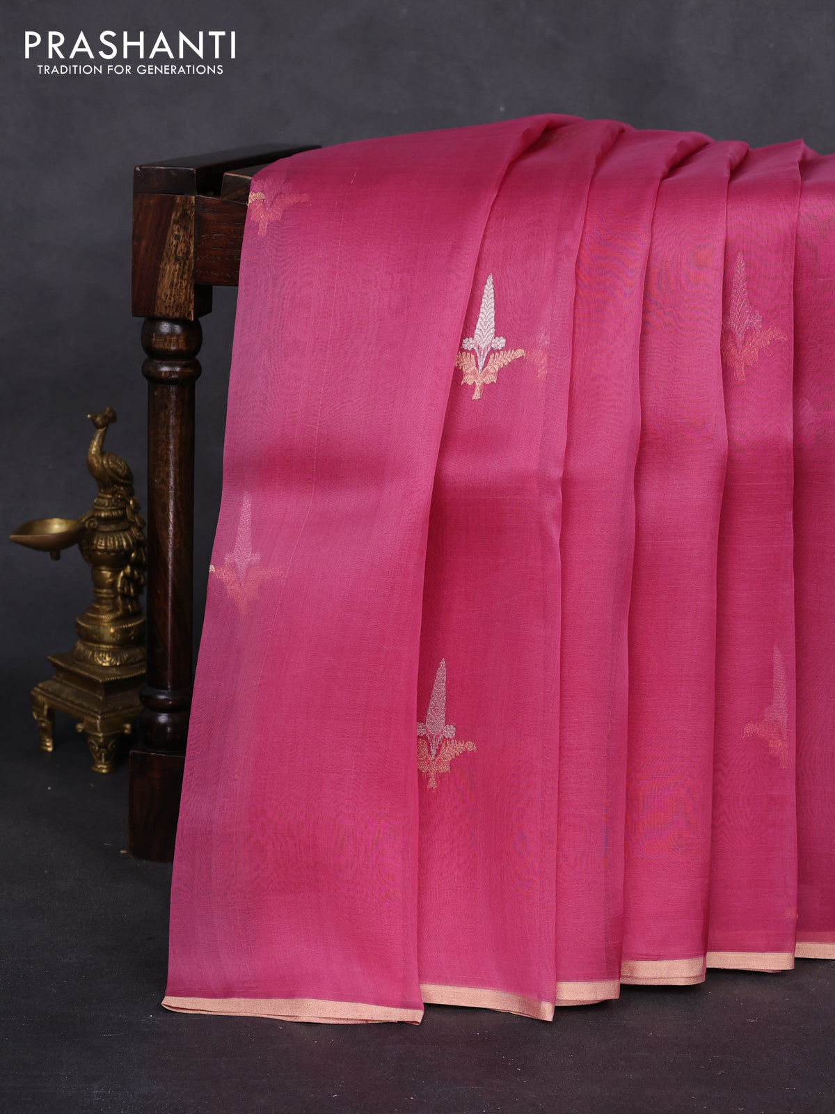 Banarasi organza silk saree pink shade with zari woven buttas and zari woven piping border