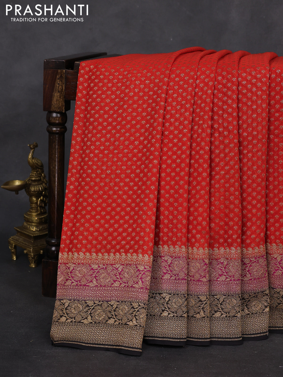 Banarasi georgette saree orange and pink black with allover woven buttas and woven border
