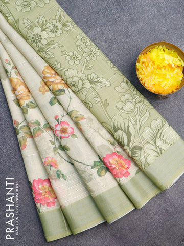 Linen cotton saree pale yellow shade and pista green with allover floral prints & sequin work and silver zari woven border