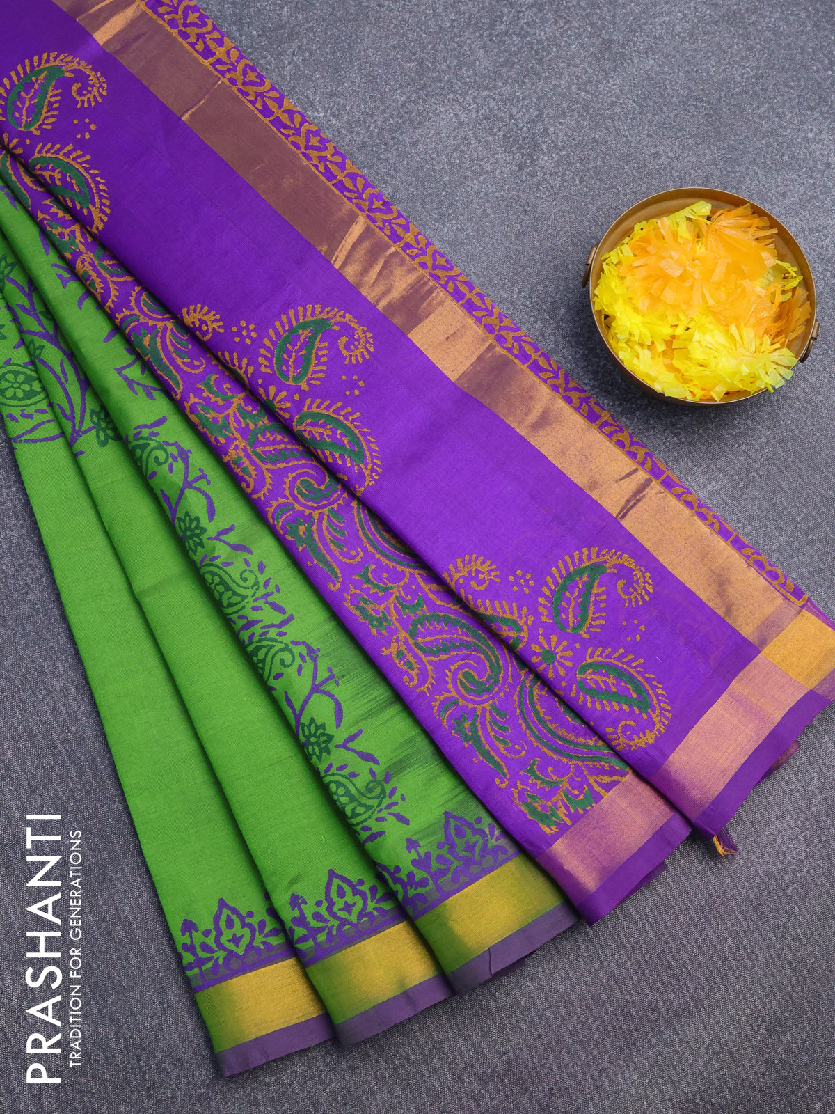 Silk cotton block printed saree light green and violet with allover prints and zari woven border