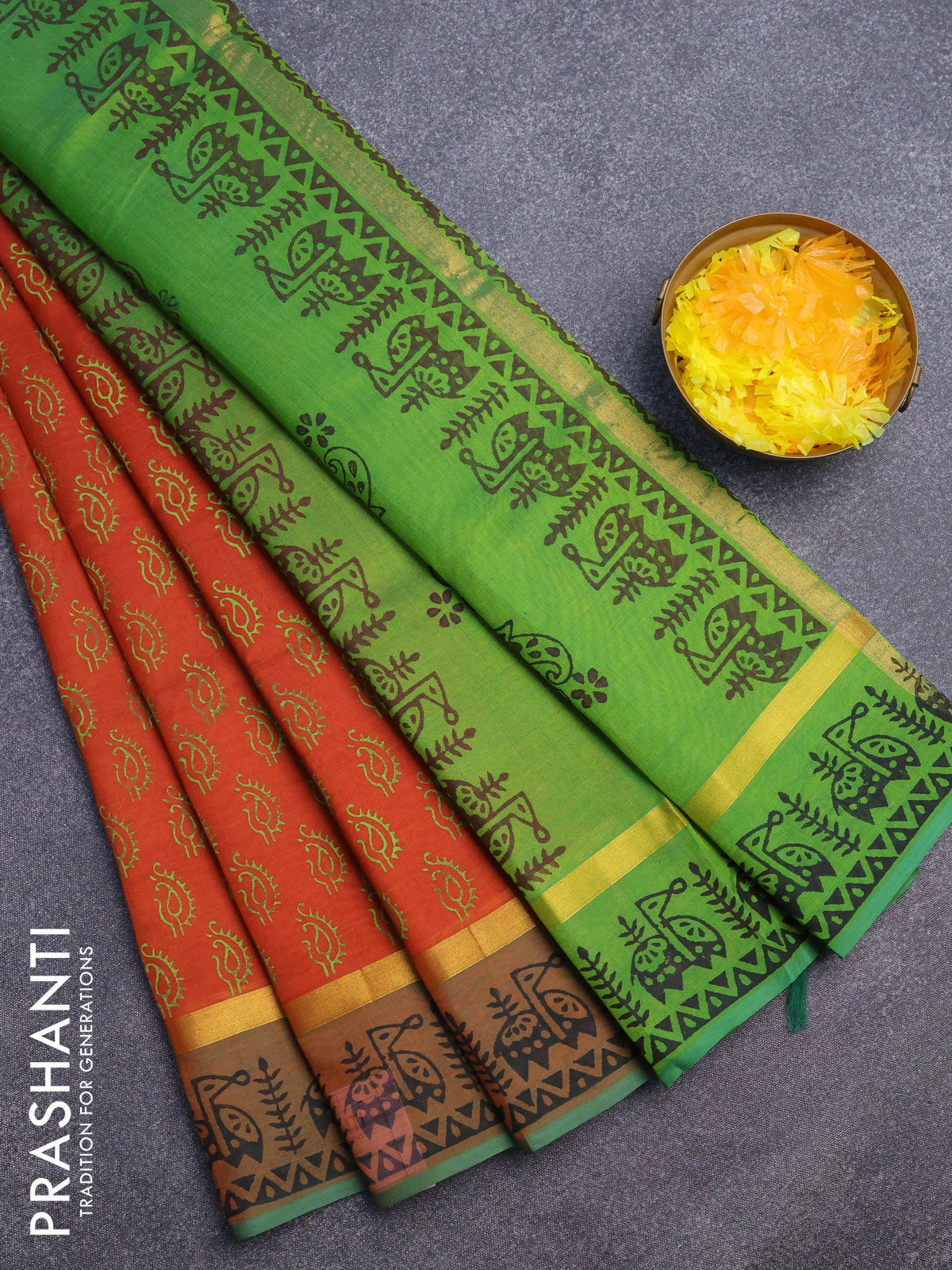 Silk cotton block printed saree rustic orange and green with paisley butta prints and zari woven simple border