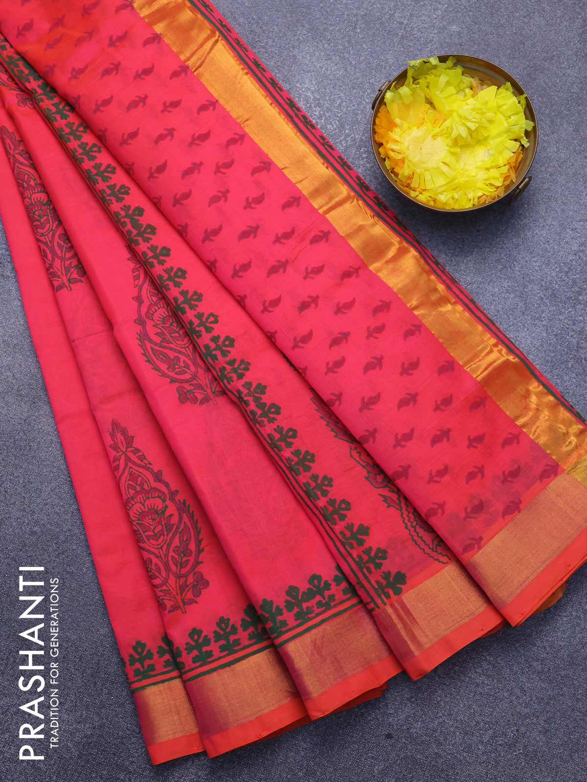 Silk cotton block printed saree dual shade of pinkish orange with butta print and zari woven border