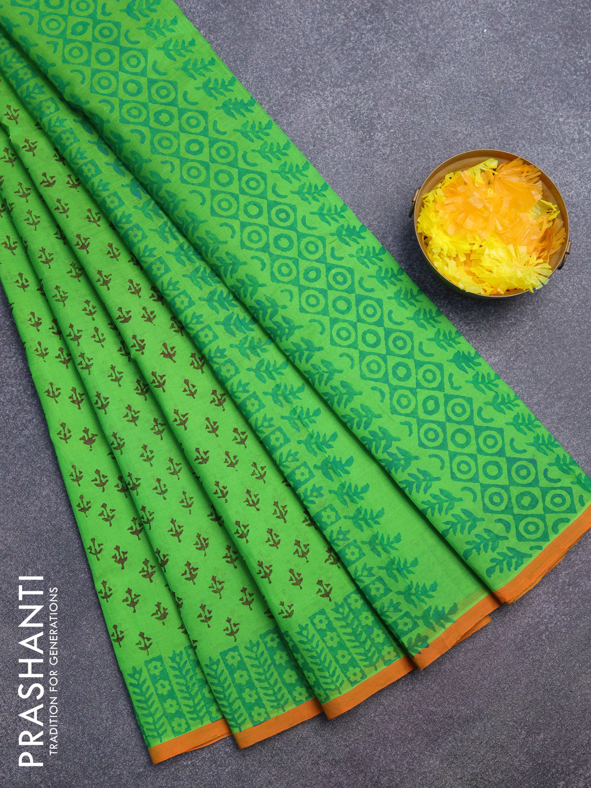 Silk cotton block printed saree light green and orange with allover butta prints and printed border