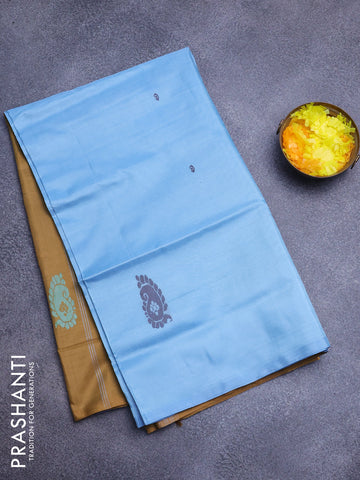 Banana pith saree light blue and dark mustrad with thread woven buttas in borderless style