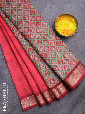 Semi dupion saree red shade and maroon with allover bandhani butta prints and zari woven border