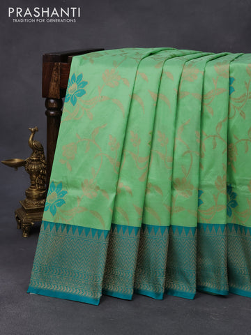 Banarasi uppada silk saree green shade and teal blue with allover floral weaves and zari woven border