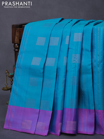 Pure kanjivaram silk saree cs blue and purple with allover zari weaves and zari woven butta border