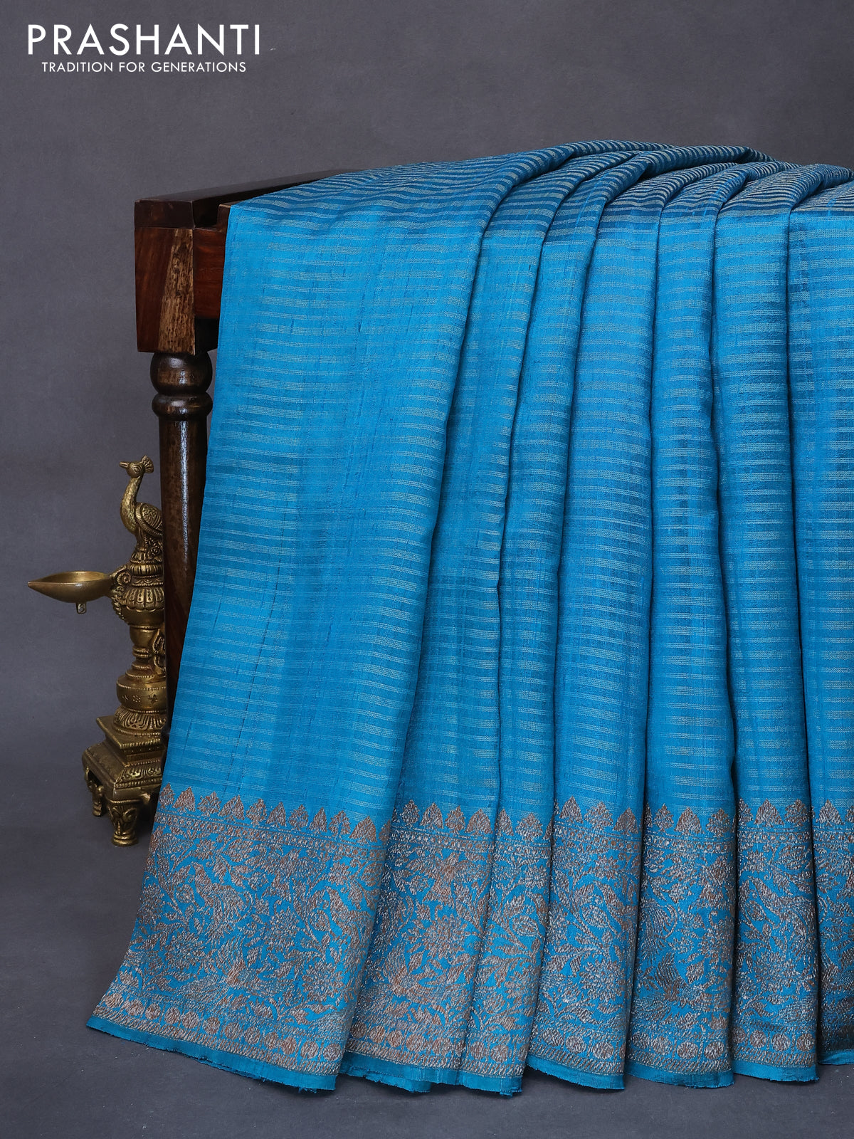 Banarasi raw silk saree rama blue with allover zari stripe pattern and woven border