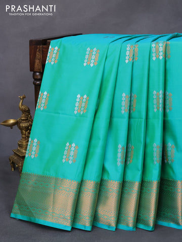 Semi kanjivaram soft silk saree dual shade of teal green and rosy brown with silver & copper zari woven buttas and rich zari woven border