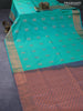 Semi kanjivaram soft silk saree dual shade of teal green and rosy brown with silver & copper zari woven buttas and rich zari woven border