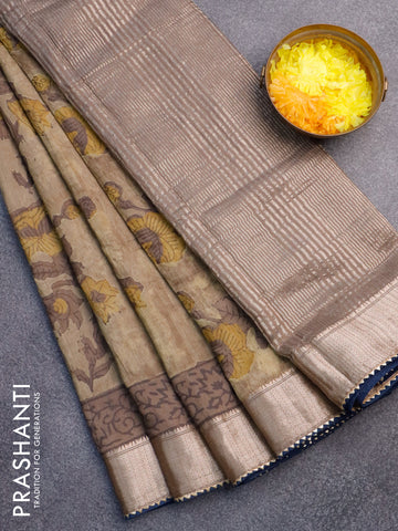 Chanderi silk cotton saree elaichi green and peacock blue with natural vegetable prints and zari woven gottapatti lace border