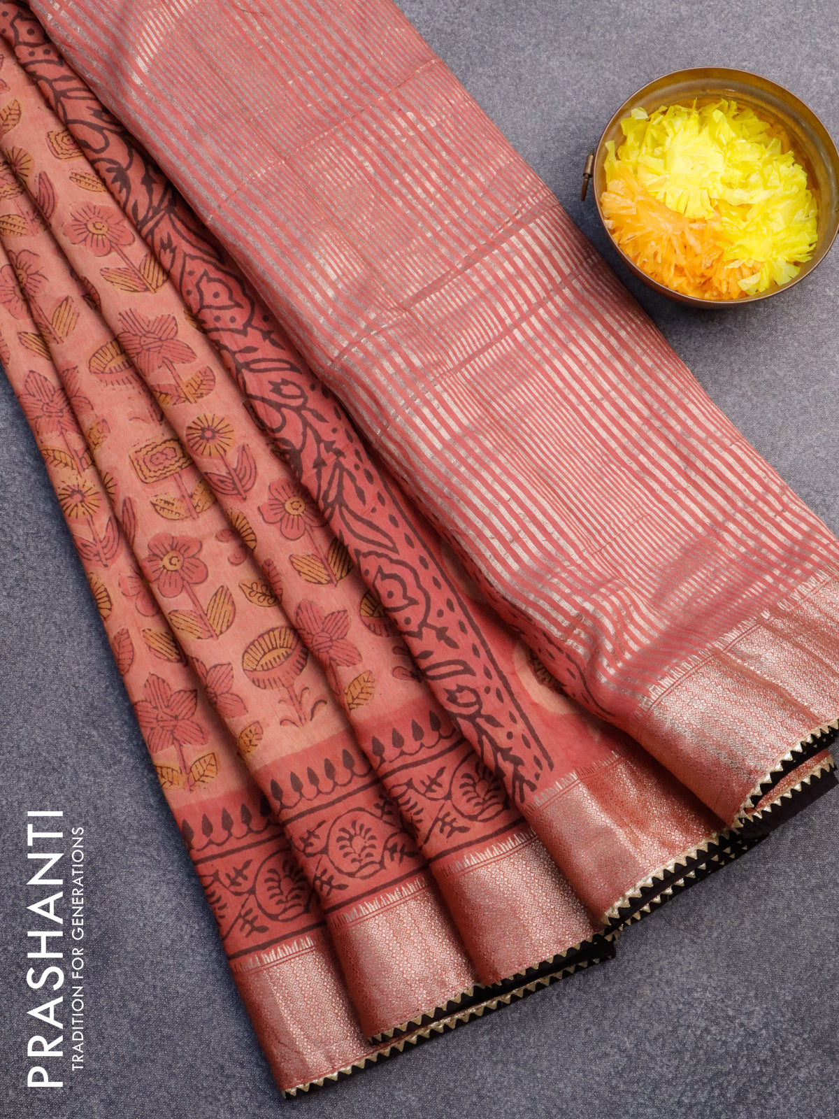 Chanderi silk cotton saree pastel peach shade and black with natural vegetable prints and zari woven gotapatti lace border