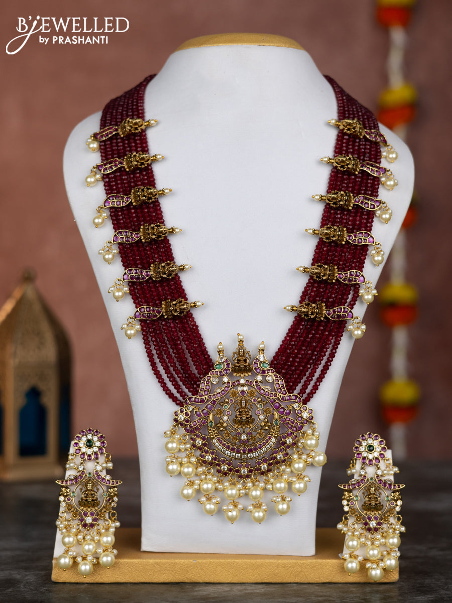 Beaded multilayer maroon necklace lakshmi pendant with kemp & cz stones and pearl hangings