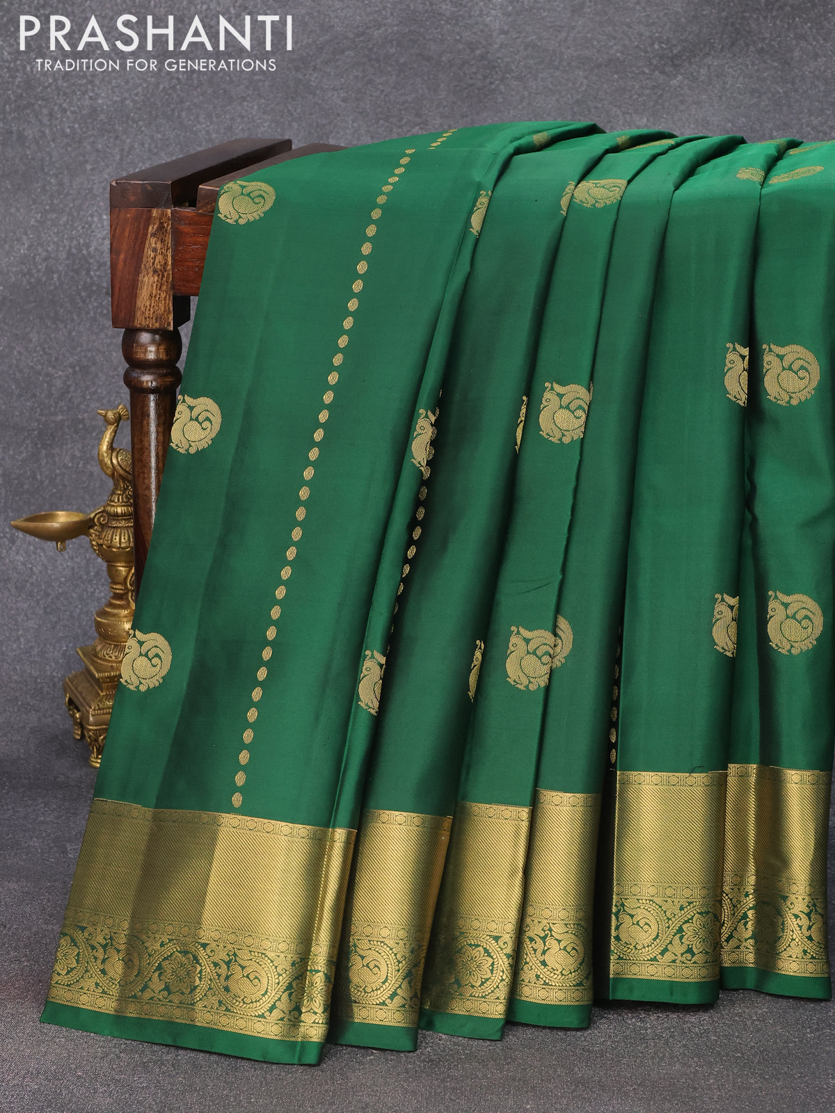 Pure kanjivaram silk saree green and dual shade of pinkish orange with annam zari woven buttas and zari woven border & Butta style