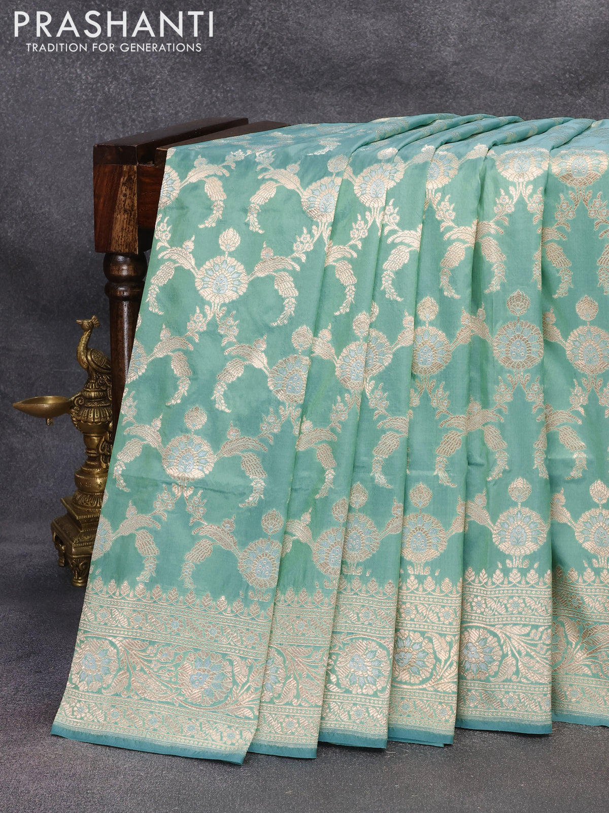 Banarasi uppada silk saree dual shade of teal blue with allover zari woven floral brocade weaves and zari woven floral border