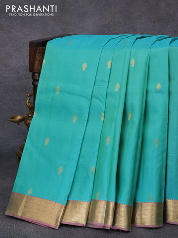 Pure kanjivaram silk saree teal green and pink with zari woven buttas and zari woven border